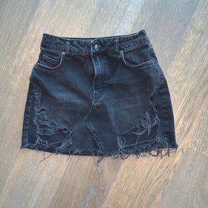 Ripped black jean skirt